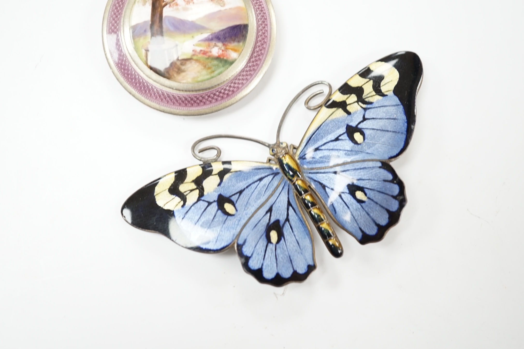 A Norwegian 925S and three colour enamel butterfly brooch, 8cm and a gilt white metal and enamel compact. Condition - poor to fair.